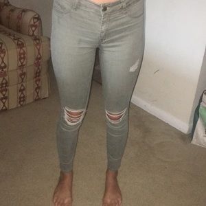 Green ripped jeans